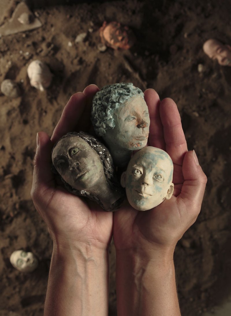 My hands with miniatures